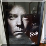 C06. Autographed Kiefer Sutherland 24 poster in frame. 32” x 29” - $75